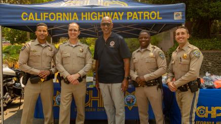 Assemblymember Holden standing with a group of California Highway Patrol Officers